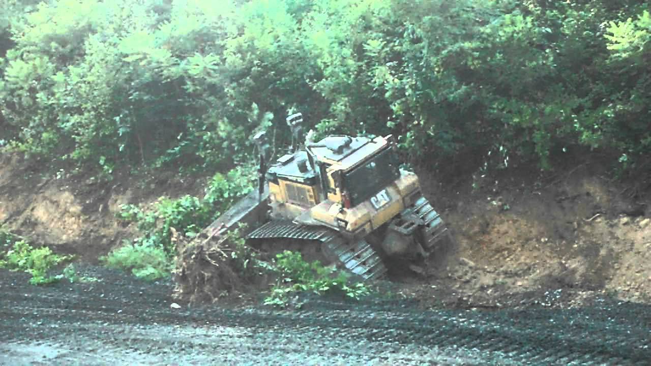 CAT dozer clearing brush