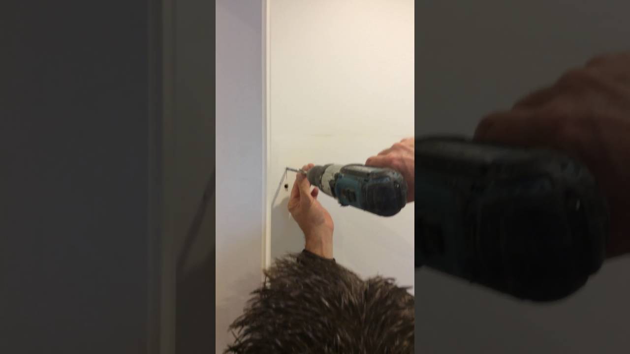 Fitting a mirror to a dot and dab wall, with the first ever Walla Anka