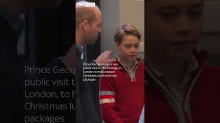 Prince George joins William in preparing food for the homeless