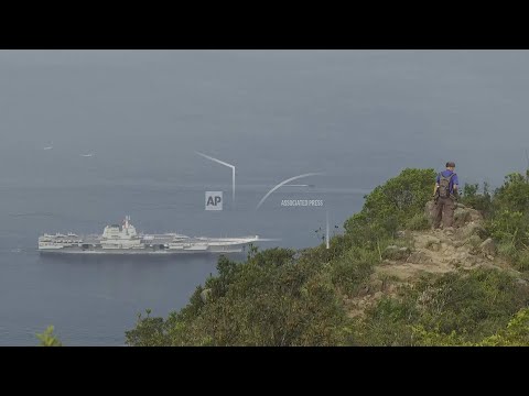 Chinese aircraft carrier sails into Hong Kong for first time
