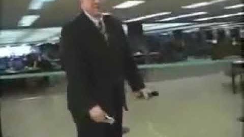 Reporter Knocks Over giant Jenga Tower Backwards