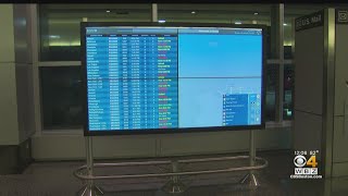 Logan Airport flight delays and cancellations drag on due to East Coast weather