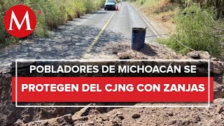 Pobladores excavan zanjas en carreteras para frenar al CJNG