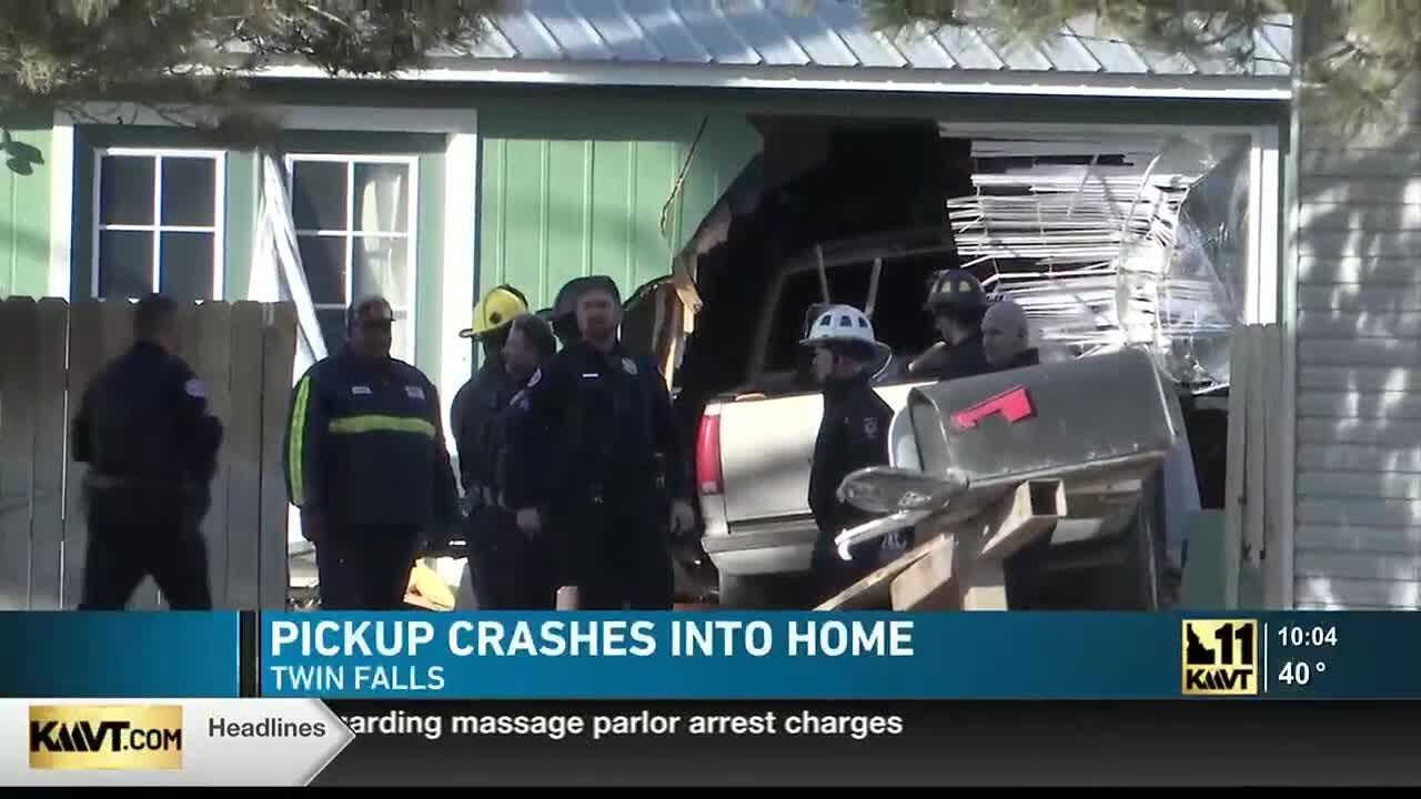 Pickup truck crashes into home - YouTube
