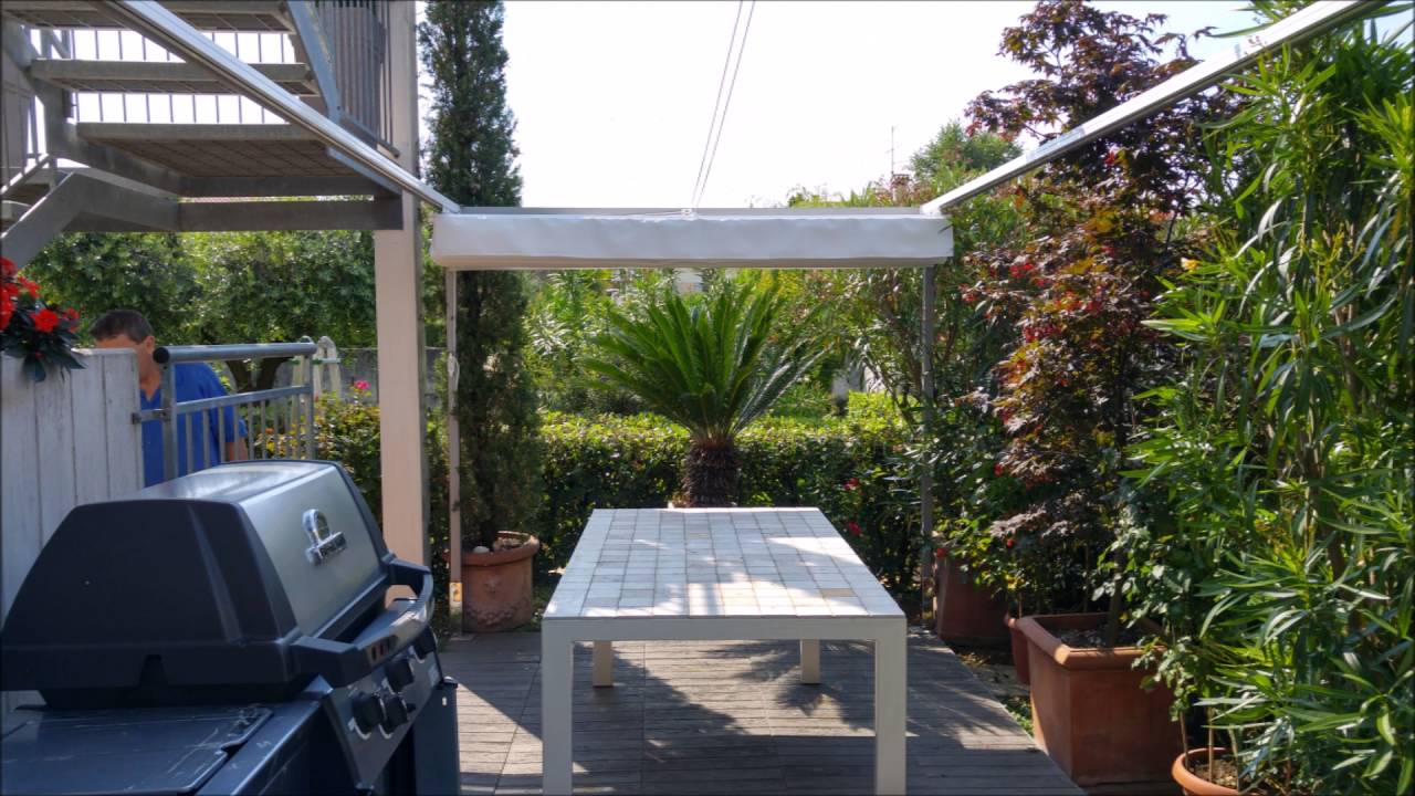 Tenda per pergola a comando manuale youtube Tende per porticati legno