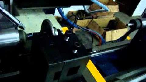 Full automatic tube spinning machine with loading & unloading
