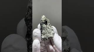 Video preview: Black Cassiterite with Mica — Xuebaoding, Sichuan · 4.5 cm