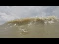 Brown beach water at galveston texas june 2019