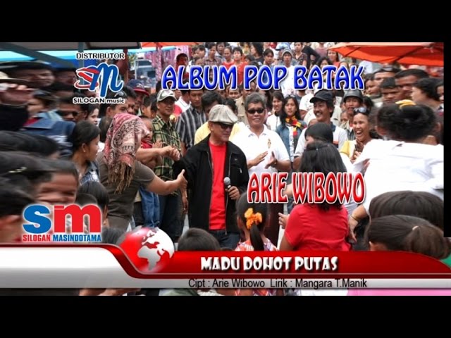 Arie Wibowo - Madu Dan Racun  - Versi Batak - Madu Dohot Putas  (Official Music Video) class=