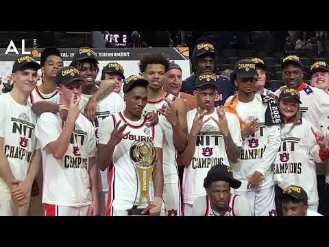 Auburn celebrates after winning the NIT