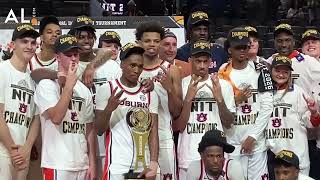 Auburn celebrates after winning the NIT