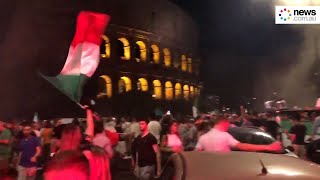 Fans celebrate near Rome's Colosseum after Italy wins Euro 2020