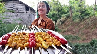 Persian chicken kebab with saffron (Joojeh kabab) in the village