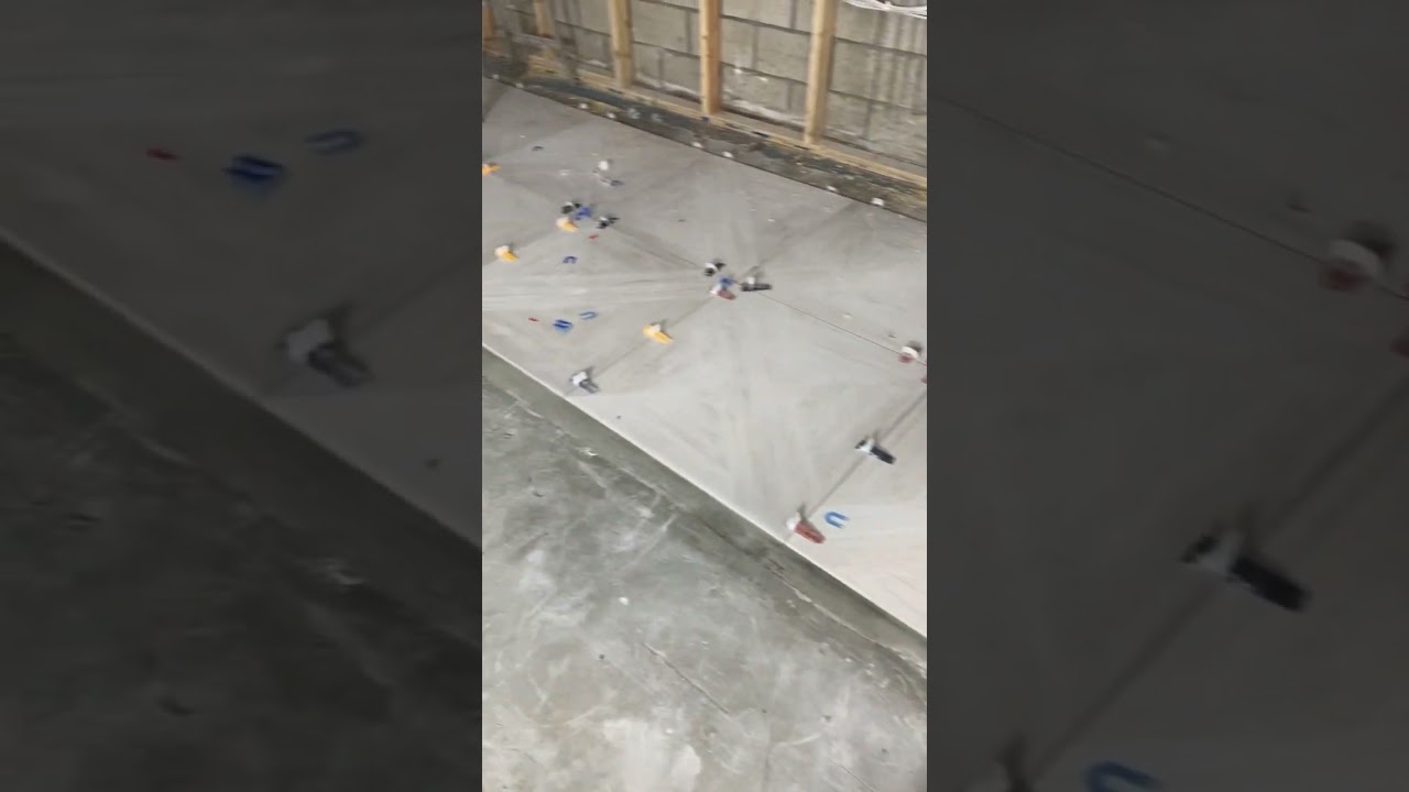 Wood looking floor tile and installation #construction #tile #tileinstallation #diy