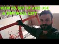 How to use a lift and hang drywall with a lift.
