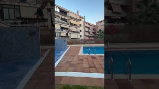 Kid Misses Pool Jump, Lands On Edge