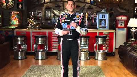 Jenson Button and Tony Stewart stretch for Mobil 1