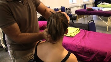 Talk To The Brain (TTTC) massage approach in a seated position