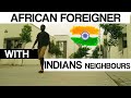 African Foreigner with Indians Neighbors