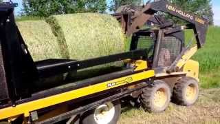 Bale wrapping with Siloflex. June 2014.