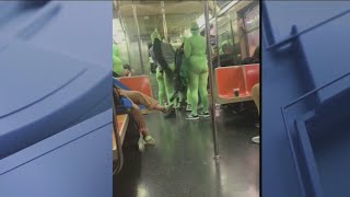 Group of 'green goblins' in neon bodysuits assault teens on NYC subway train