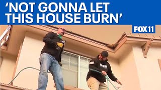 Castaic Fire: Homeowners race to protect home from brush fire