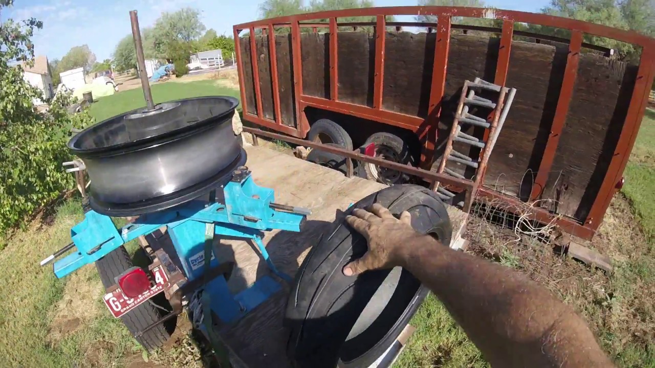 Mounting motorcycle tire to rim using cycle hill tire machine YouTube