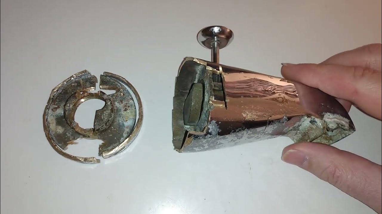 Removal of a stuck tub spout, using a dremel rotary saw, for a rear