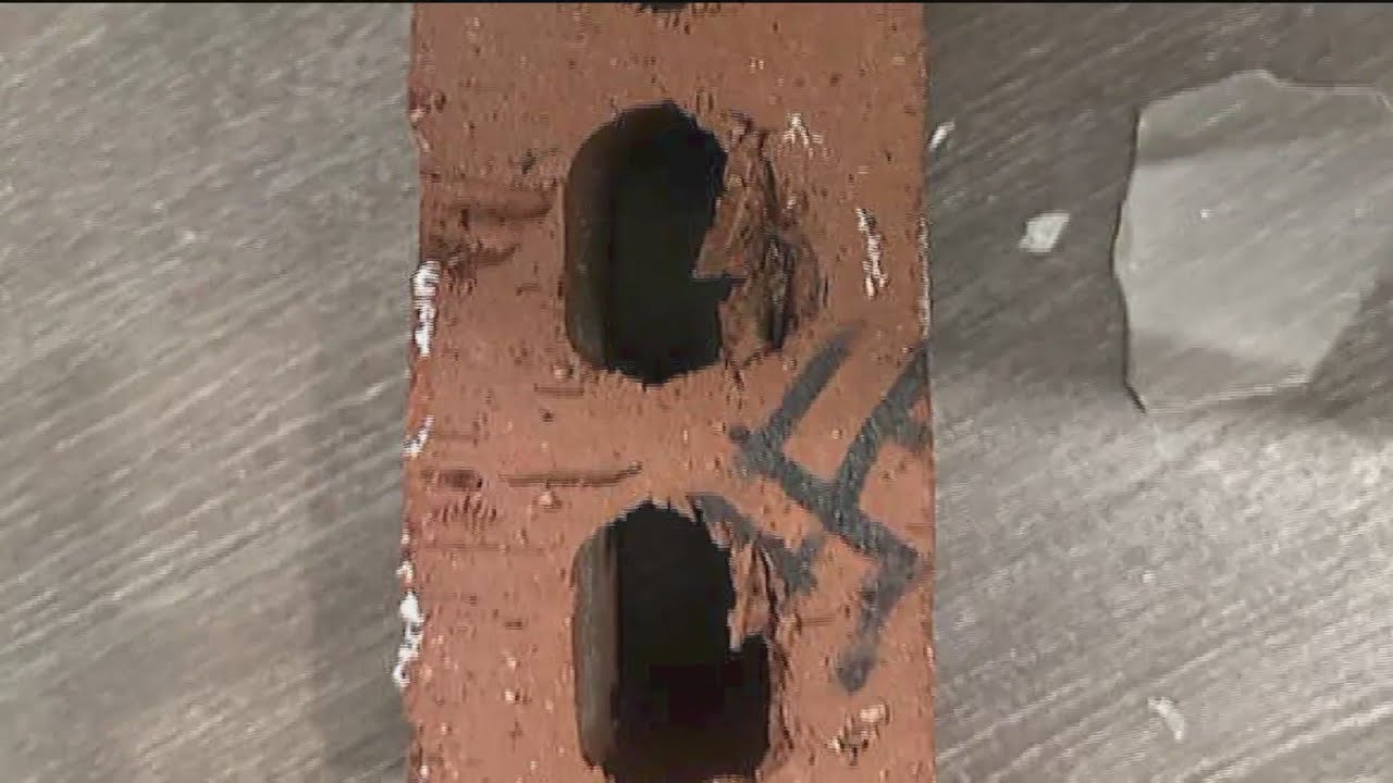 Brick covered in swastikas thrown through window of Chabad Jewish Center