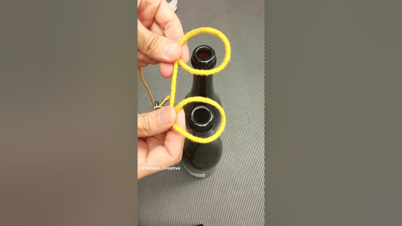 Как завязать узел на бутыли для переноски Using a single piece of string to securely carry a clay pot GIF Rope plant hange