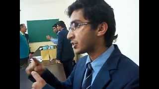 Student demonstrating his science model at UPES IGNITE