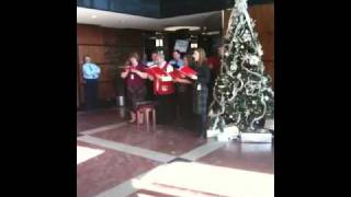 Christmas carolers at office