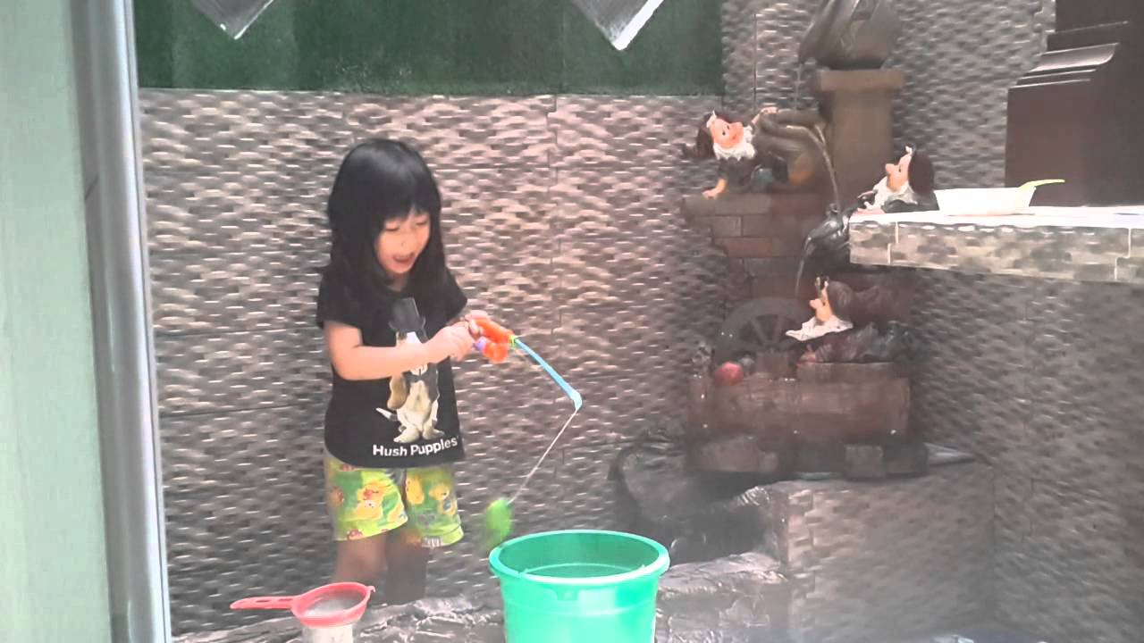 Cath playing on her new fountain dwarf n pond - YouTube