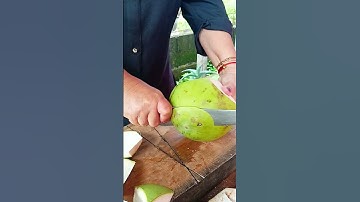 Smart technique to peel unique young green Coconut