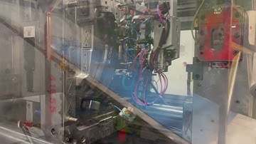 Injection molding with Robot and End of Arm Tool (EOAT)