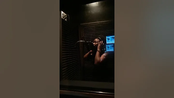 Brittany Holloway in the booth going over a Buddy ...