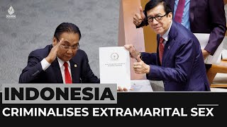 Indonesia passes new criminal code, outlaws sex outside marriage