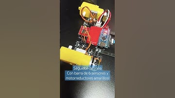 Robot seguidor de Línea con barra de 6 sensores y motorreductores amarillos.