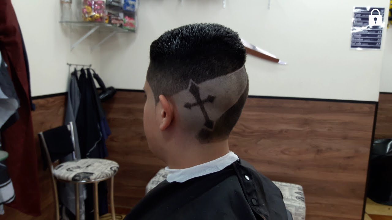 cruz no corte de cabelo masculino