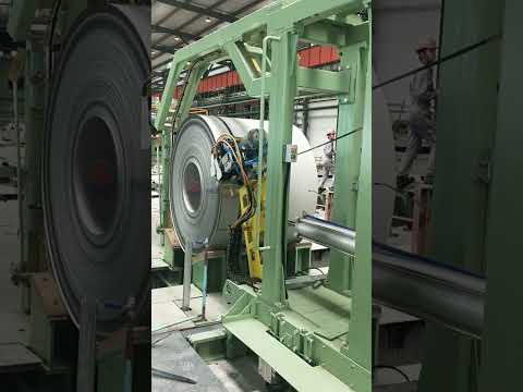 Automatic circumferential steel coil strapping machine