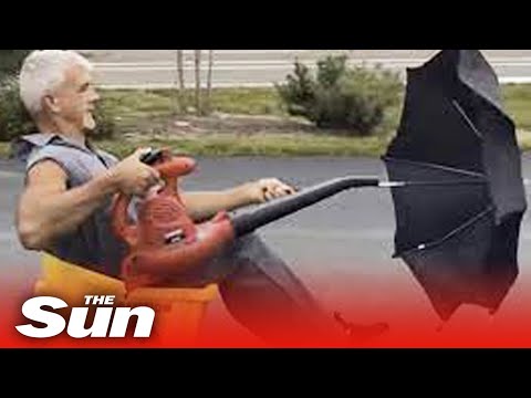 Man drives around town in a leaf blower-powered vehicle.