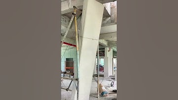 The construction team used the scaffold wheel group translatio method to install large cement slabs.