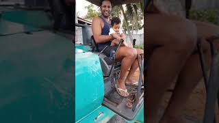 Boys love Backhoe Excavators! බර වාහන එලවපු කාලේ