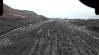 Cat 777 100 ton dump truck slipping and sliding