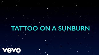 Video thumbnail of "Luke Combs - Tattoo on a Sunburn (Official Lyric Video)"