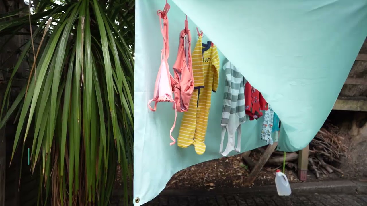 PeggyRain Clothesline rescues your washing from the rain. As seen