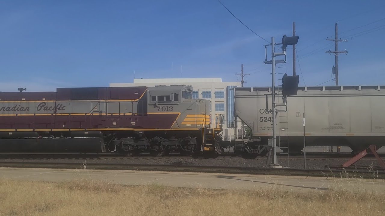 Canadian Pacific 8046 leads a grain train with CP 7013 in Roseville, CA ...