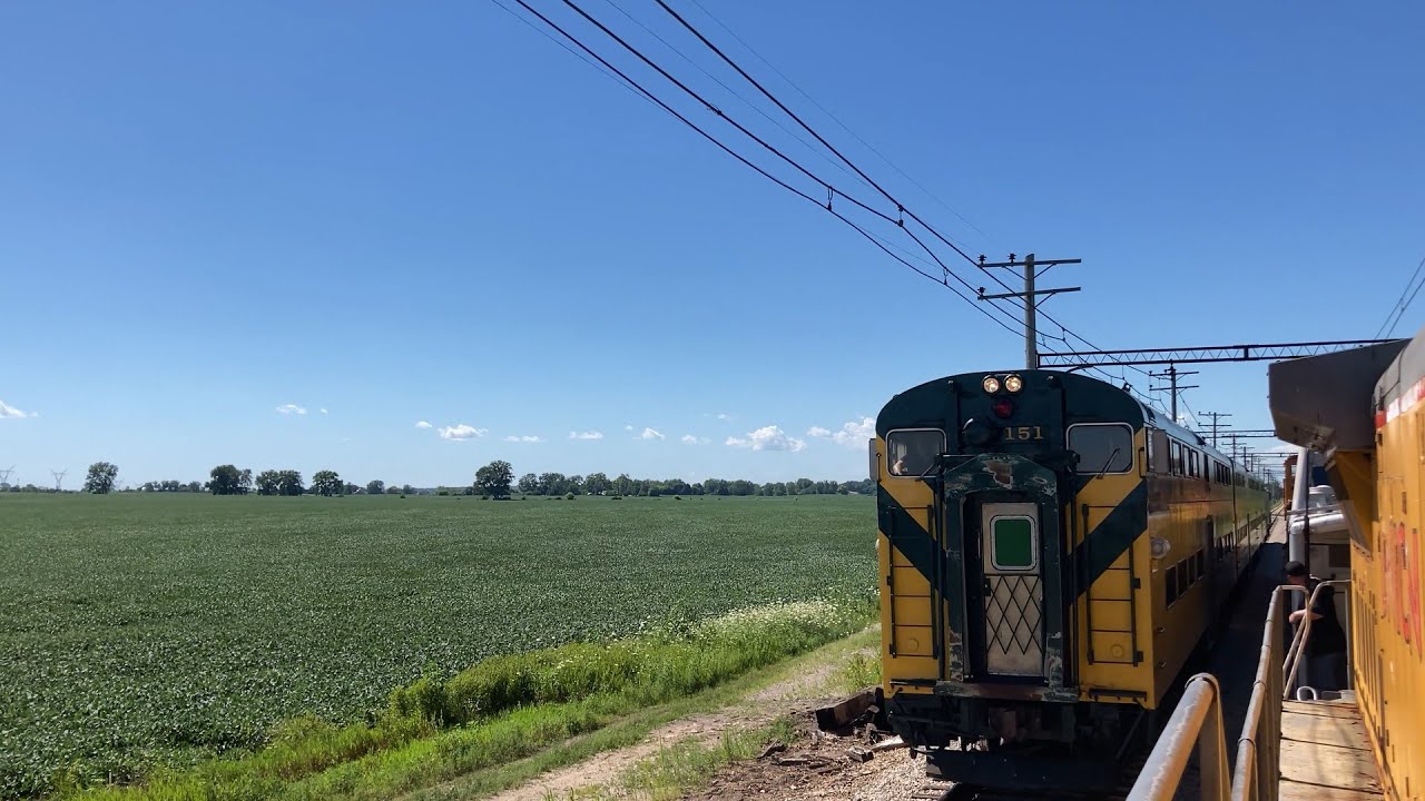 CNW Bi-Levels Meet UP 1848 at IRM - YouTube