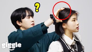 Boy try to tie girl friend's hair for the first time!