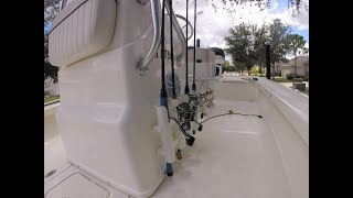 In this video I am adding a couple of add-ons to my Mako 21LTS boat. two rod holders from Bass Pro Shop, ratcheting transom tie 